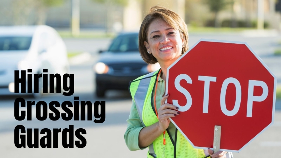 "Hiring Crossing Guards" with woman holding Stop sign
